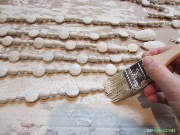 how to make beads look like wood for a wood bead chandelier, Life on Virginia Street on Remodelaholic